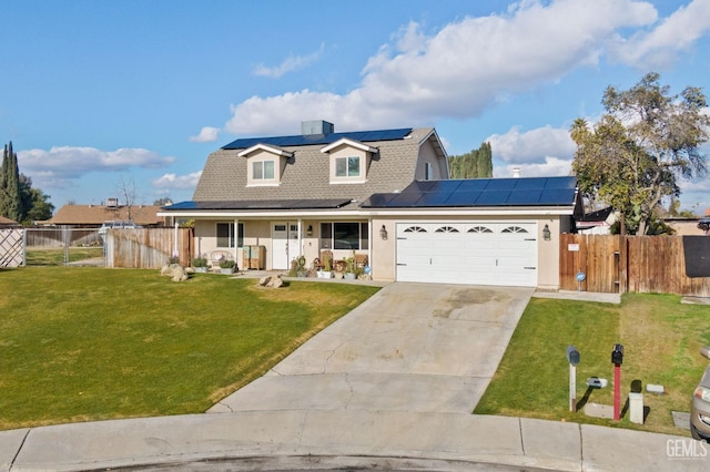 view of front of property featuring a garage, covered porch, a front lawn, and solar panels