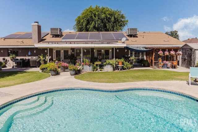 7116 Jolynn St, Bakersfield, CA 93308 - swimming pool with a patio, a yard, and central AC