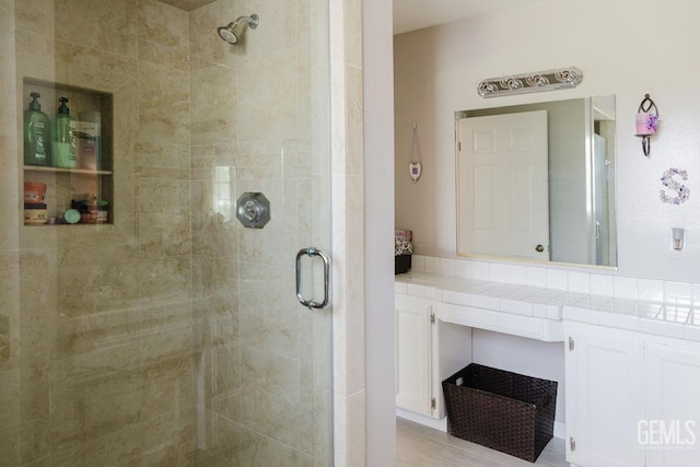 7116 Jolynn St, Bakersfield, CA 93308 - bathroom featuring a shower stall and vanity
