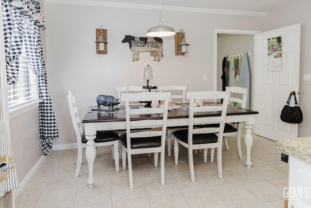 7116 Jolynn St, Bakersfield, CA 93308 - dining area with ornamental molding, light tile patterned floors, and baseboards