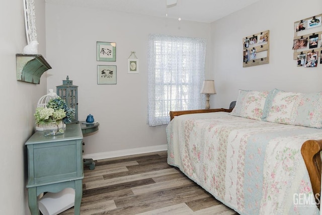 7116 Jolynn St, Bakersfield, CA 93308 - bedroom featuring wood finished floors and baseboards