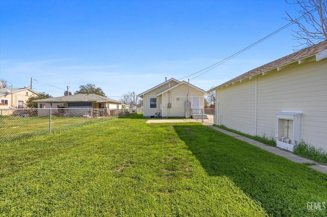 view of yard featuring a fenced backyard