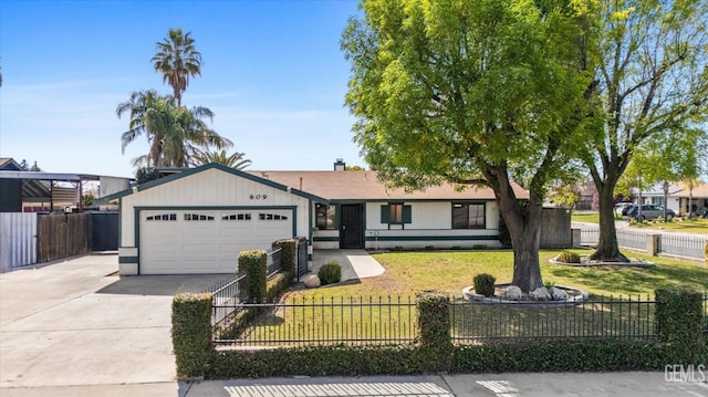 single story home with a fenced front yard, a front yard, concrete driveway, and an attached garage