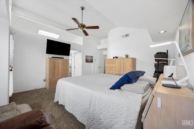 carpeted bedroom featuring high vaulted ceiling, visible vents, and a ceiling fan