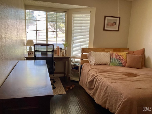 2304 Mountain Oak Rd, Bakersfield, CA 93311 - bedroom with dark wood finished floors and an office area