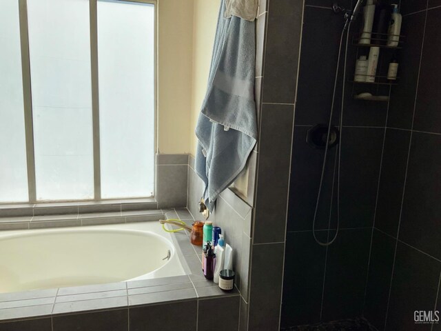 2304 Mountain Oak Rd, Bakersfield, CA 93311 - full bathroom featuring tiled shower and a garden tub