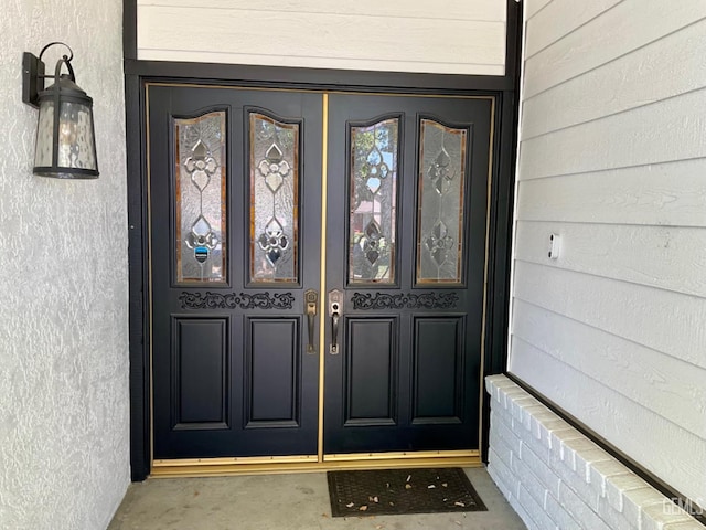2304 Mountain Oak Rd, Bakersfield, CA 93311 - view of exterior entry featuring stucco siding