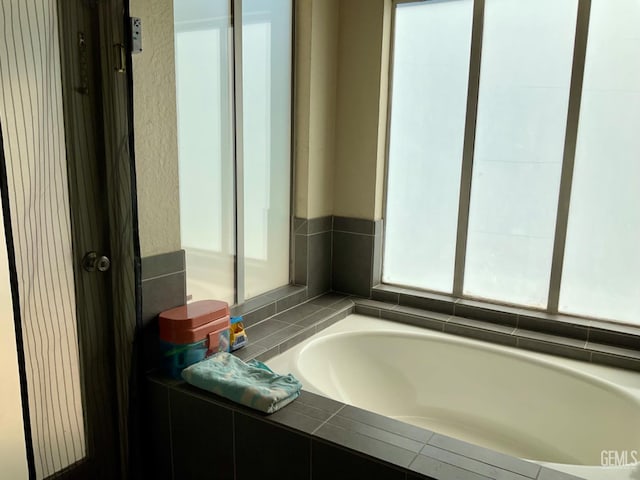 2304 Mountain Oak Rd, Bakersfield, CA 93311 - bathroom with a garden tub