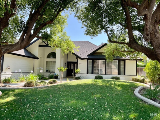 2304 Mountain Oak Rd, Bakersfield, CA 93311 - ranch-style home featuring stucco siding and a shingled roof