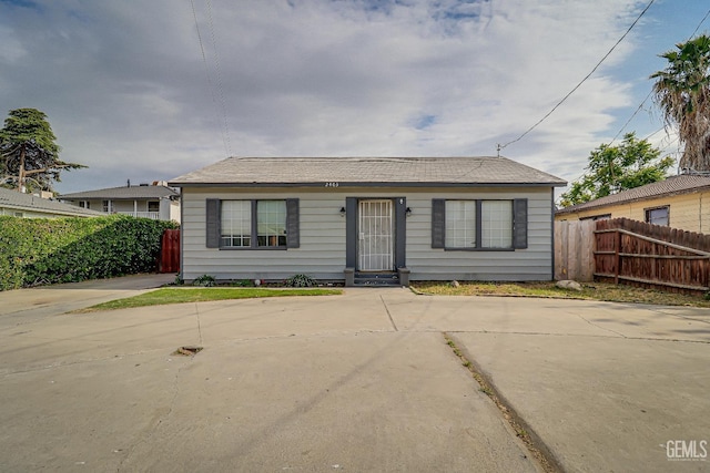 view of front of house with fence