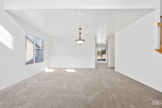 empty room with carpet flooring