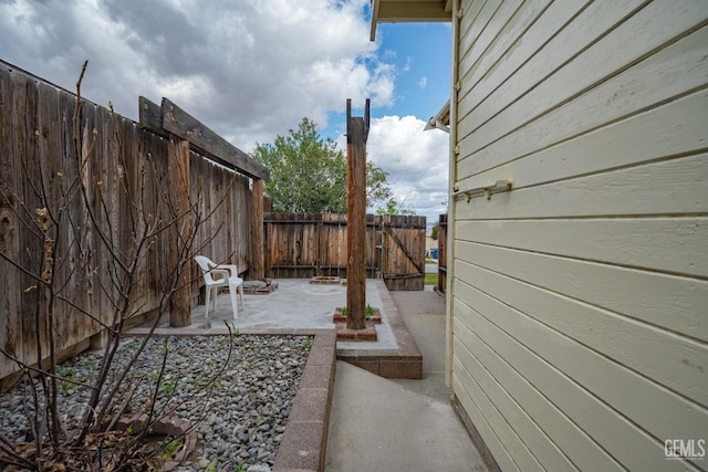 view of yard with a patio area and fence