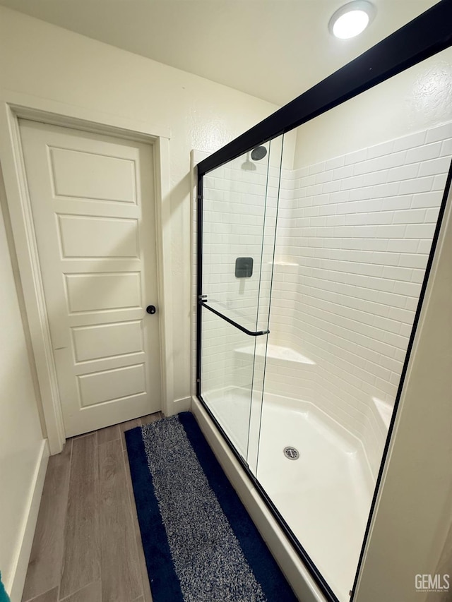 6009 Cardano Ave, Bakersfield, CA 93313 - full bath with a shower stall and wood finished floors