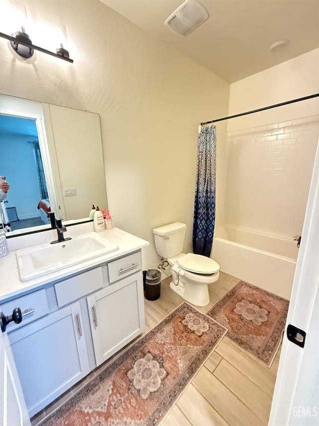 6009 Cardano Ave, Bakersfield, CA 93313 - bathroom with vanity and shower / bathtub combination with curtain