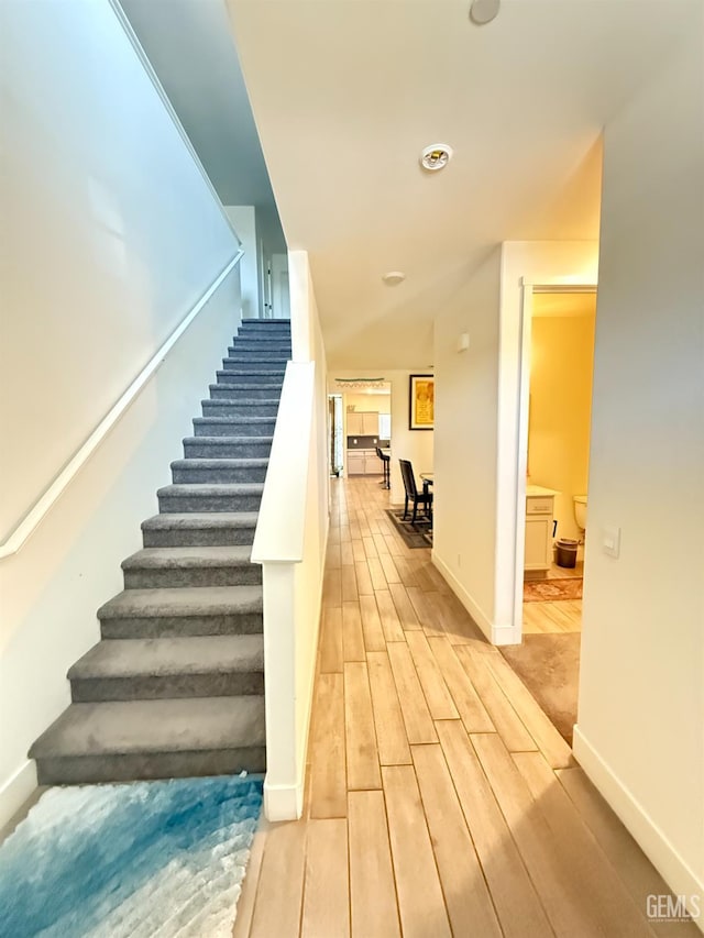 6009 Cardano Ave, Bakersfield, CA 93313 - stairway with wood finished floors and baseboards