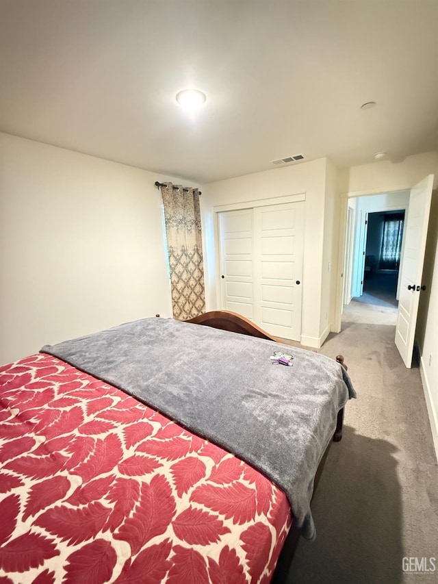6009 Cardano Ave, Bakersfield, CA 93313 - bedroom with light colored carpet and a closet