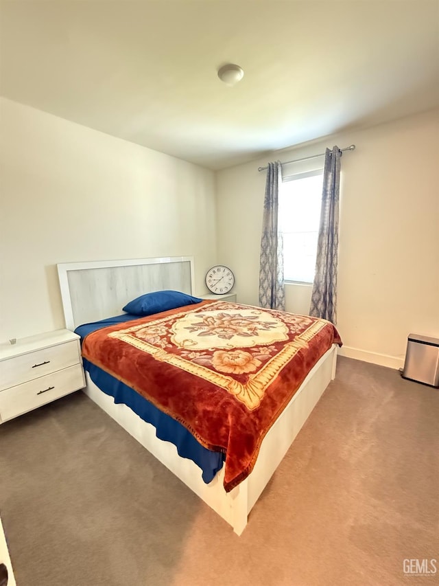 6009 Cardano Ave, Bakersfield, CA 93313 - carpeted bedroom featuring baseboards