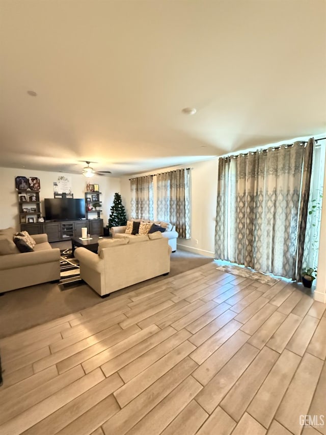 6009 Cardano Ave, Bakersfield, CA 93313 - living room with light wood-type flooring and a ceiling fan