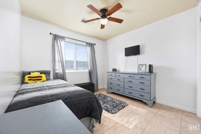 bedroom featuring ceiling fan and light tile patterned floors