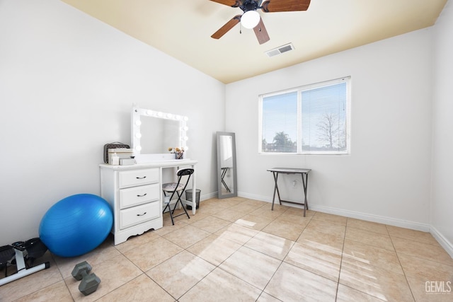 office with light tile patterned floors and ceiling fan