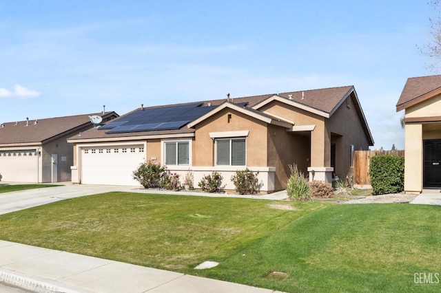 ranch-style house with a garage, a front yard, and solar panels