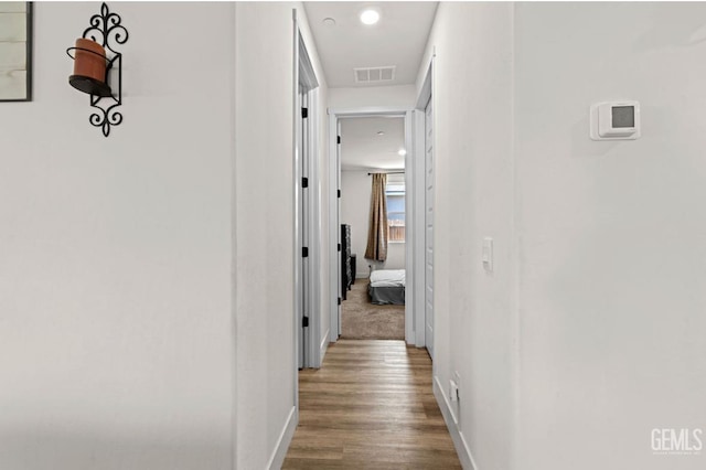 6607 Wind Wolfs Ln, Bakersfield, CA 93313 - hall with wood finished floors and recessed lighting