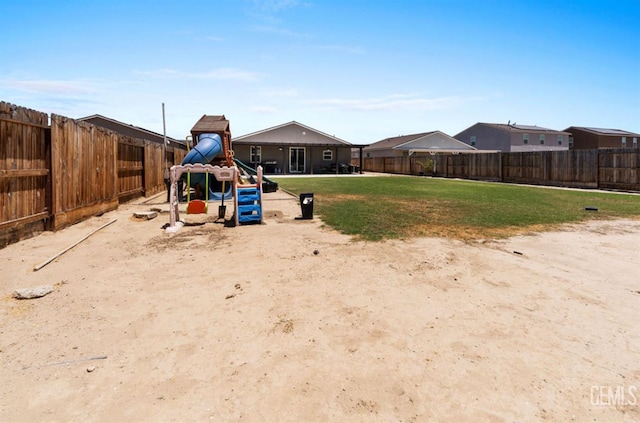 6607 Wind Wolfs Ln, Bakersfield, CA 93313 - fenced backyard with a playground