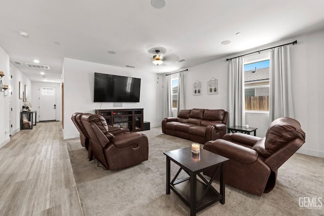 6607 Wind Wolfs Ln, Bakersfield, CA 93313 - living area with recessed lighting and light wood finished floors