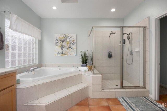 full bath with tile patterned flooring, a stall shower, recessed lighting, and a bath