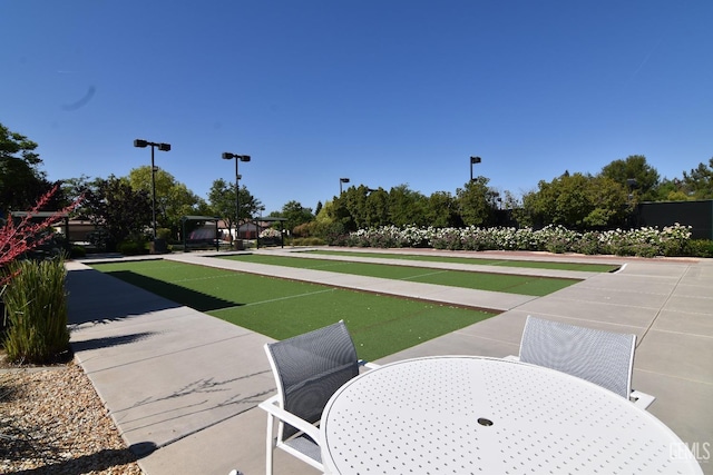 5712 Wisteria Valley Rd, Bakersfield, CA 93306 - view of home's community featuring a game area and outdoor dining area
