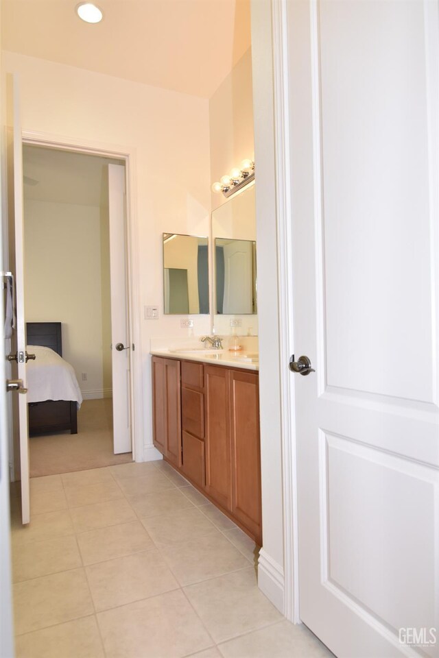 5712 Wisteria Valley Rd, Bakersfield, CA 93306 - ensuite bathroom with vanity, tile patterned flooring, recessed lighting, and baseboards