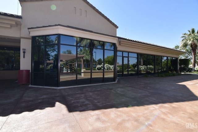 5712 Wisteria Valley Rd, Bakersfield, CA 93306 - entrance to property with a tile roof and stucco siding