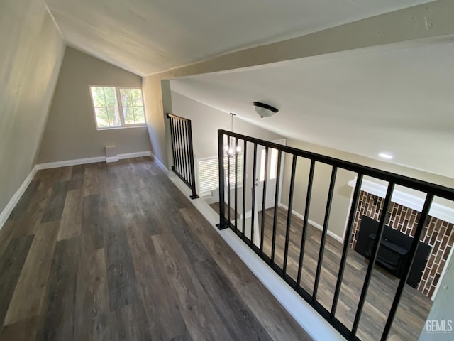 4700 Caliente Bodfish Rd, Caliente, CA 93518 - hall with lofted ceiling, wood finished floors, baseboards, and an upstairs landing