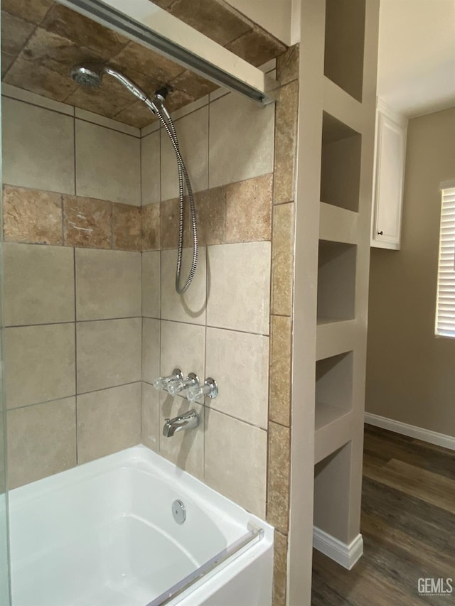 4700 Caliente Bodfish Rd, Caliente, CA 93518 - bathroom featuring wood finished floors, washtub / shower combination, and baseboards