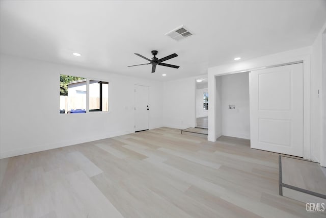 164 Rodriguez Ave, Shafter, CA 93263 - unfurnished living room with recessed lighting, a ceiling fan, and light wood-type flooring