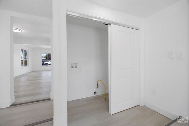 164 Rodriguez Ave, Shafter, CA 93263 - washroom with hookup for a washing machine and light wood-style floors