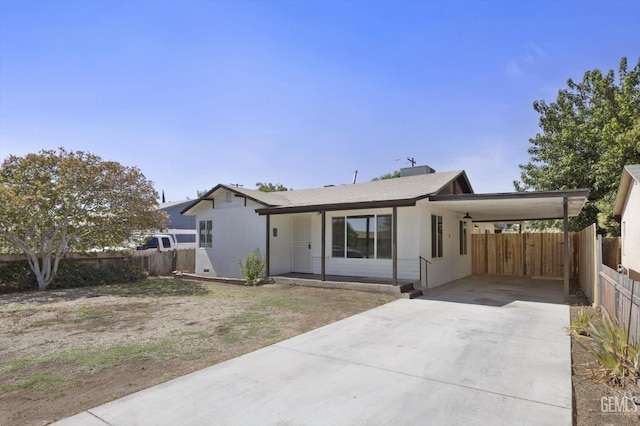 164 Rodriguez Ave, Shafter, CA 93263 - view of front facade with an attached carport and concrete driveway