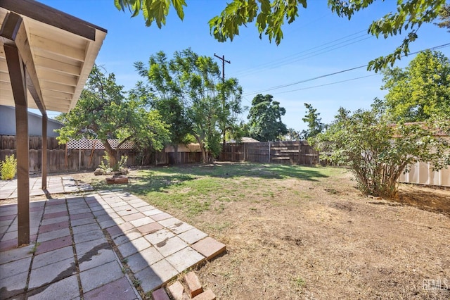 164 Rodriguez Ave, Shafter, CA 93263 - fenced backyard featuring a patio area