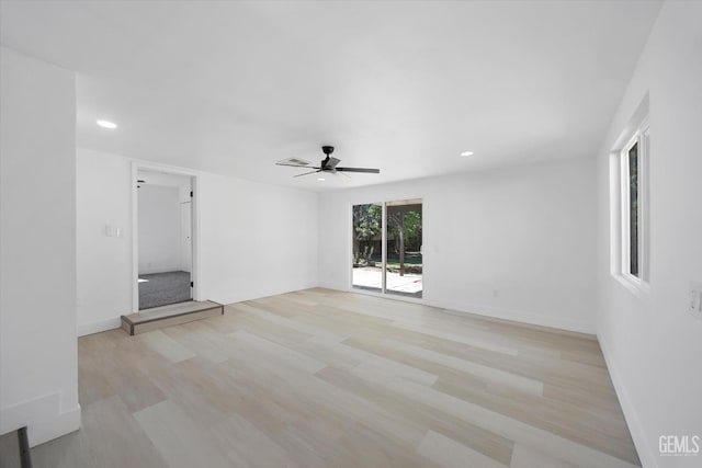 164 Rodriguez Ave, Shafter, CA 93263 - unfurnished living room featuring ceiling fan, light wood finished floors, and recessed lighting