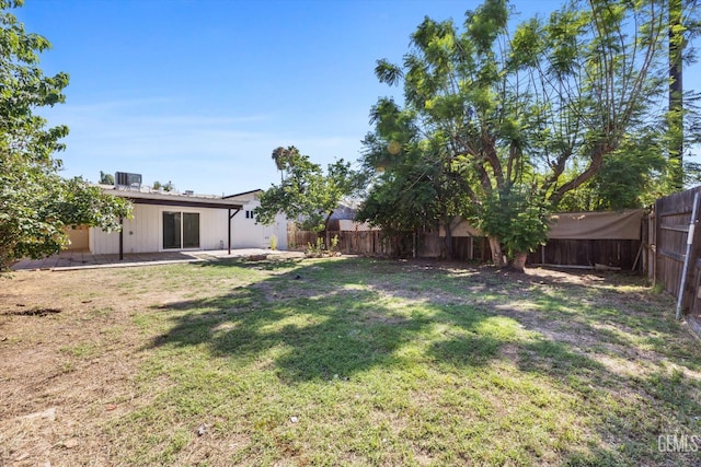 164 Rodriguez Ave, Shafter, CA 93263 - fenced backyard featuring a patio