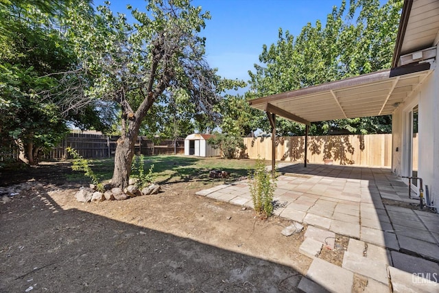 164 Rodriguez Ave, Shafter, CA 93263 - fenced backyard with a patio and a shed