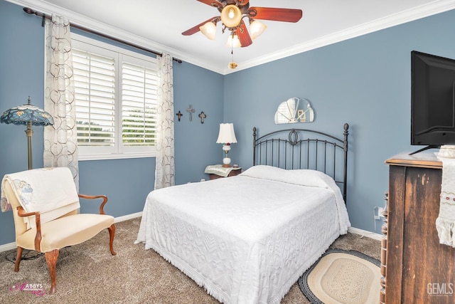 carpeted bedroom with a ceiling fan, baseboards, and ornamental molding