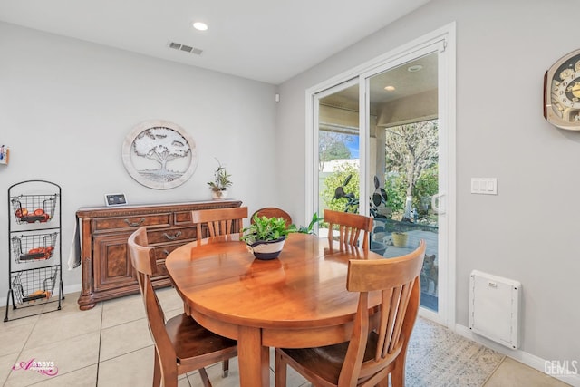 dining room featuring light tile patterned floors, visible vents, baseboards, and recessed lighting