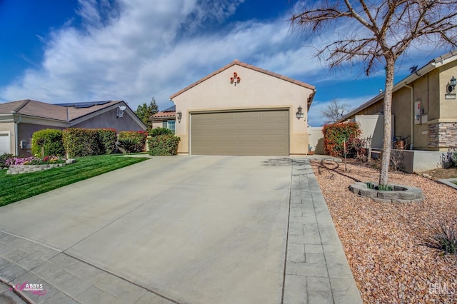 mediterranean / spanish house with stucco siding, an attached garage, driveway, and a tiled roof