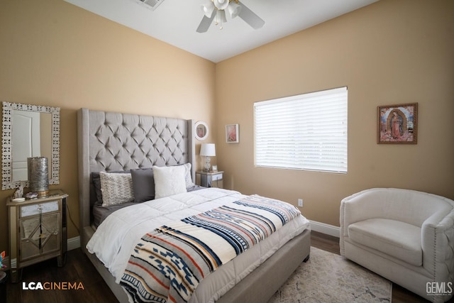 bedroom with ceiling fan and hardwood / wood-style floors