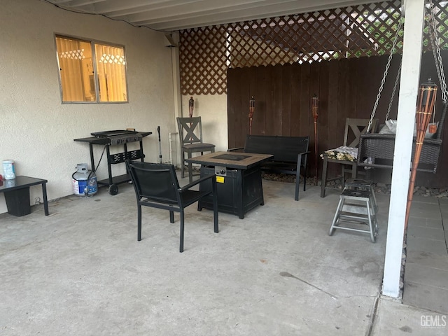 view of patio featuring a fire pit