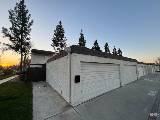 garage with fence