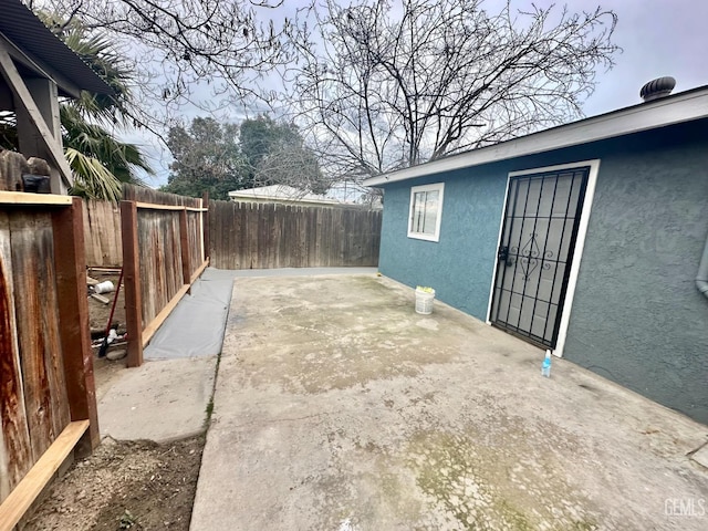 2912 Wilson Rd, Bakersfield, CA 93304 - fenced backyard featuring a patio