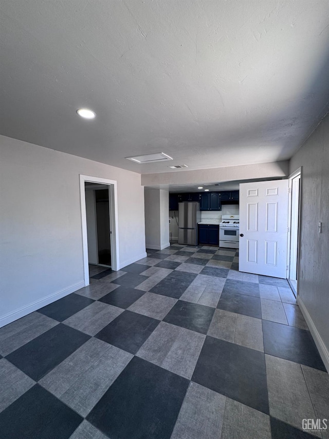 2912 Wilson Rd, Bakersfield, CA 93304 - unfurnished living room with attic access and recessed lighting