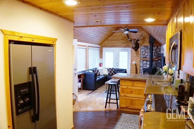 45864 Upndown Rd, Posey, CA 93260 - kitchen with appliances with stainless steel finishes, wood ceiling, a peninsula, vaulted ceiling, and a ceiling fan